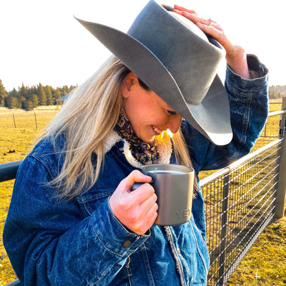 Cowgirl Drinking Coffee From Yeti Cup